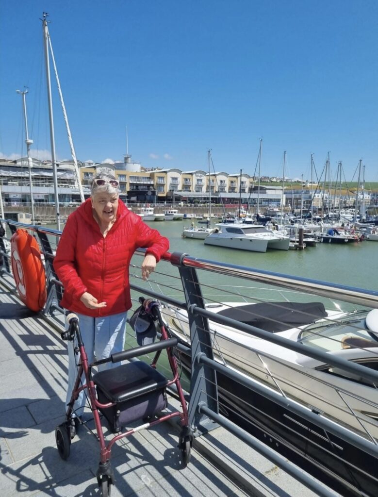 resident posing by the harbour