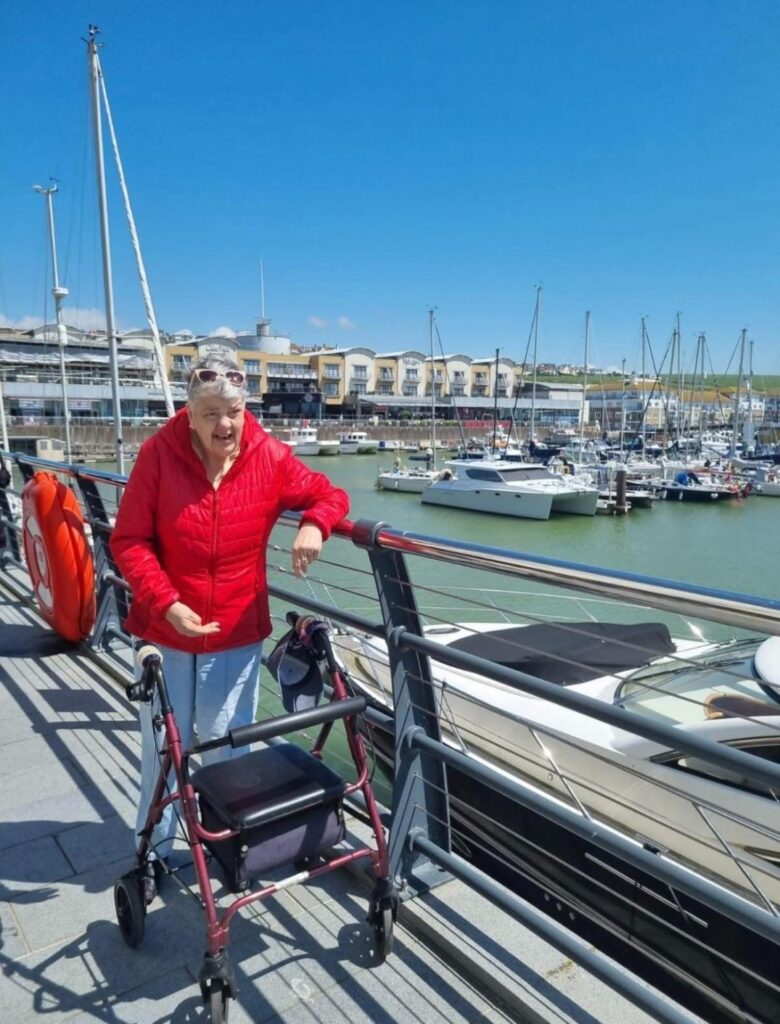 resident posing by the harbour
