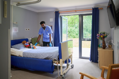 staff making residents bed