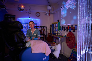 resident with nurse in the sensory room