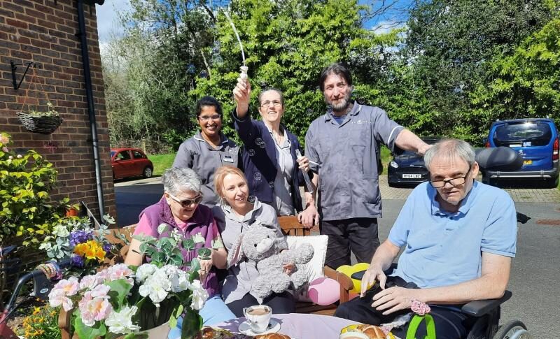 care centre residents outdoors socialising